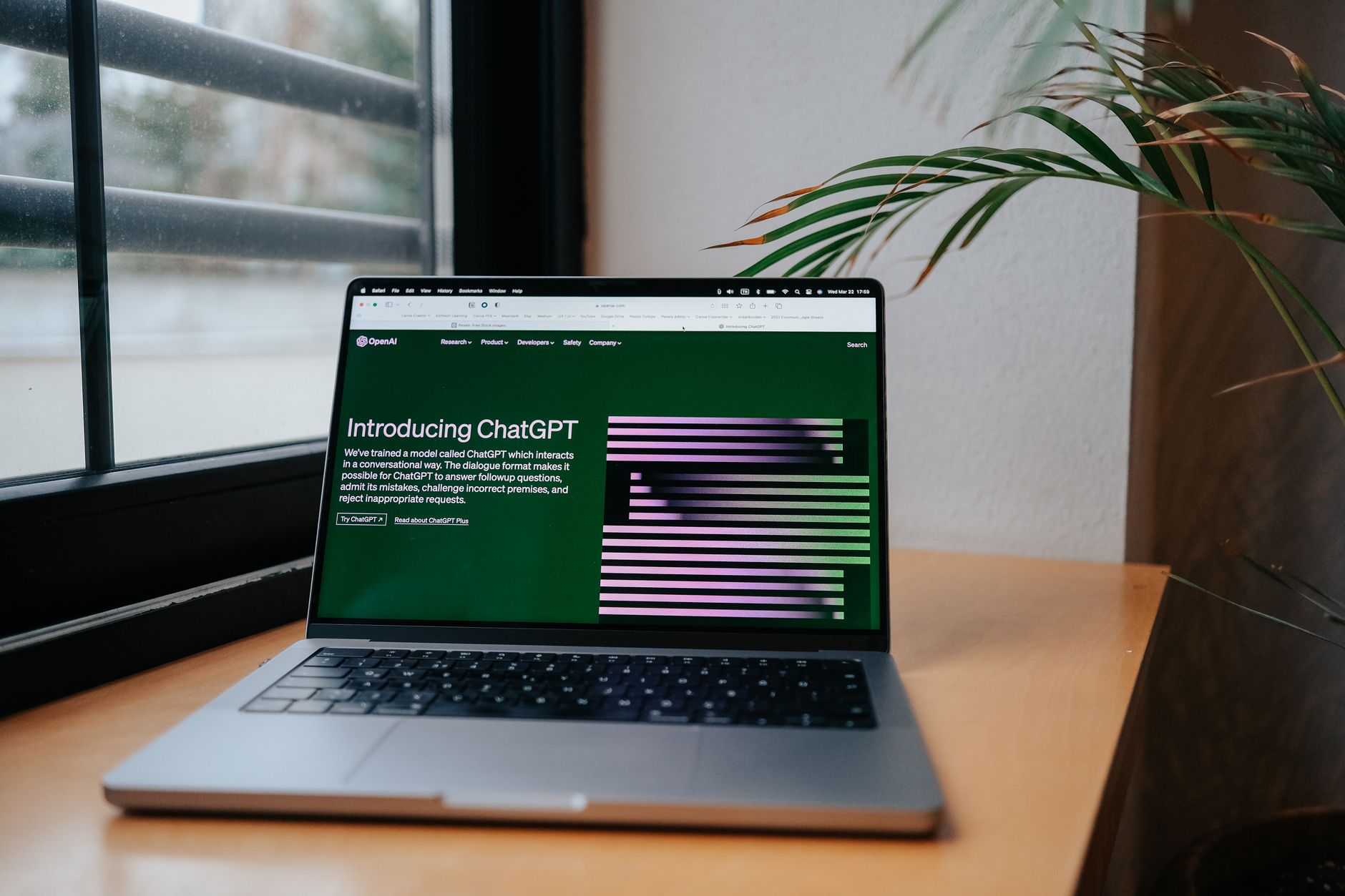 OpenAI API dashboard displayed on a laptop showing an API key